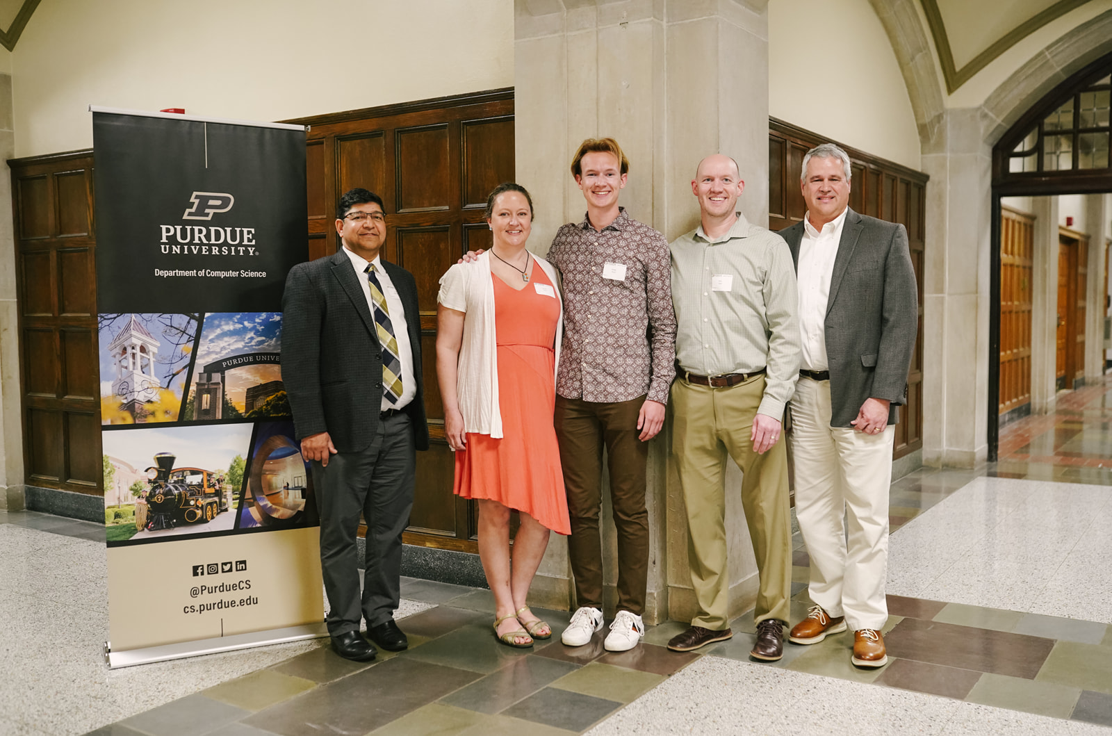 Brady Hurd with his family, Professor Sunil Prabhakar, and Assistant Head Randy Bond
